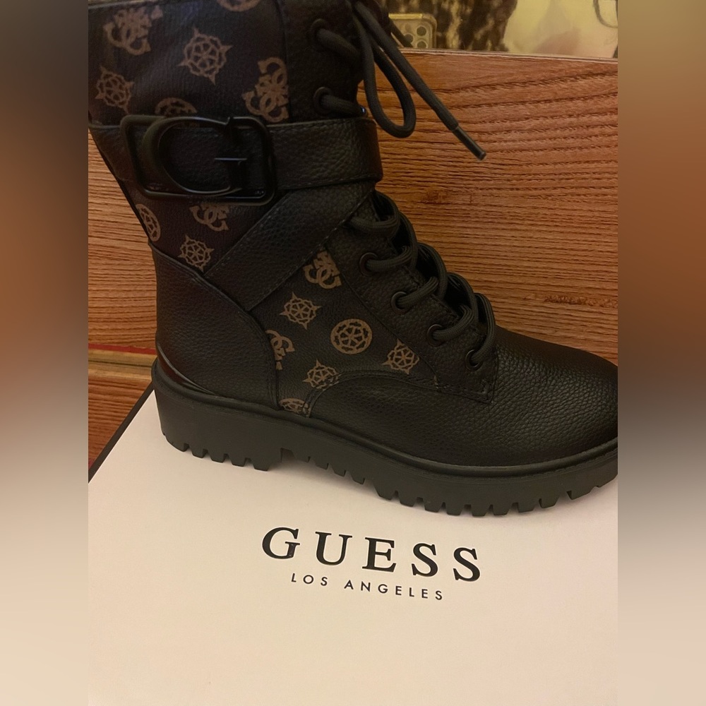 Selling brand new, never been worn Guess combat boots.